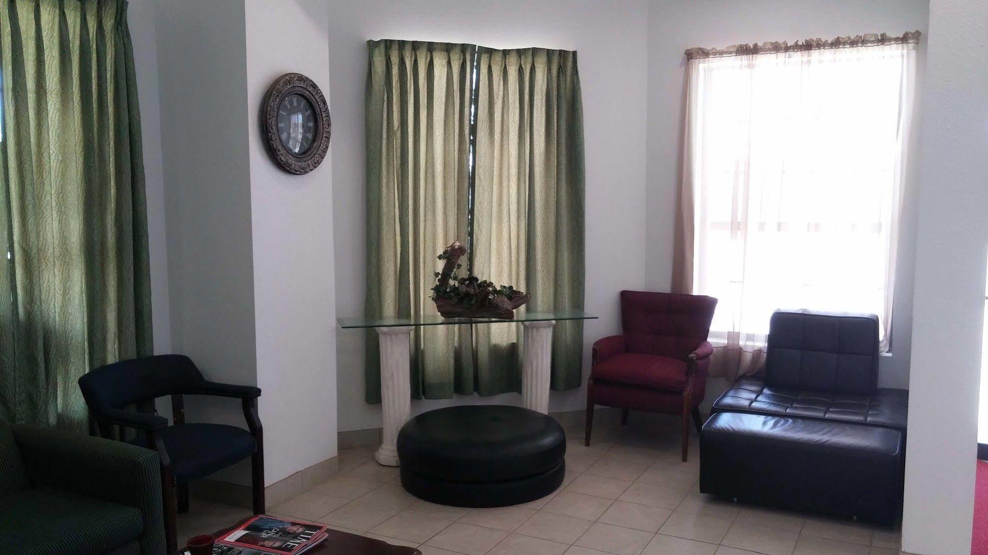 Country Regency Inn & Suites Manvel ภายนอก รูปภาพ