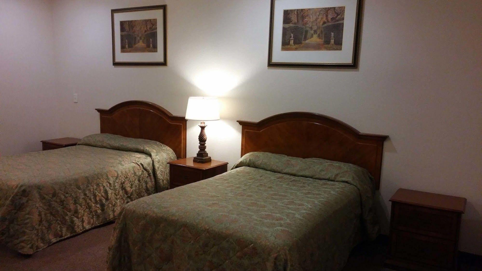 Country Regency Inn & Suites Manvel ภายนอก รูปภาพ
